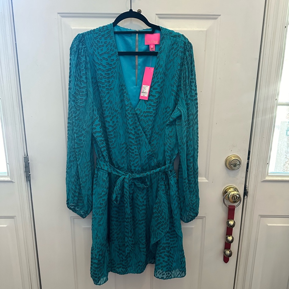 Knee length Lilly Pulitzer teal dress with black accents